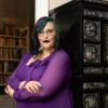Raven in front of her office.